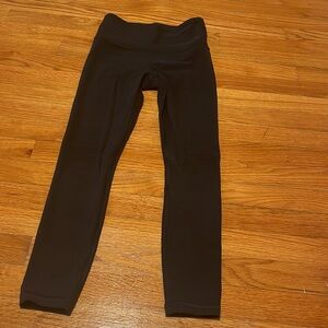 XS black athleta 3/4 legging. Barely worn, like new.